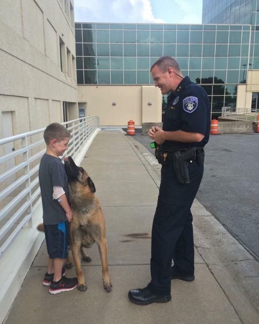 THE LITTLE BOY CLUNG TO MY K9 PARTNER—THEN HE TOLD ME SOMETHING THAT BROKE MY HEART It was supposed to be just another day outside the station. I had Koda, our K9, by my side when I spotted the boy. Maybe 8 or 9 years old, wearing a worn-out t-shirt and shorts that had seen better days. At first, he just stood there, watching. His hands fidgeted at his sides, eyes darting between me and Koda. “You wanna say hi?” I asked, keeping my voice light. He hesitated, then slowly stepped forward. Koda, sensing no threat, wagged his tail and lifted his head. The boy reached out, touching the dog’s fur like it was the most fragile thing in the world. And then, out of nowhere, he wrapped his arms around Koda’s neck and held on. Tight. I expected him to let go after a few seconds. But he didn’t. His little shoulders started shaking. His fingers dug deeper into Koda’s fur. That’s when I realized—he was crying. I crouched down. “Hey, buddy… what’s wrong?” The boy sniffled, burying his face against Koda. Then, barely above a whisper, he said something that made my chest tighten. “He looks just like my dad’s dog… before he left.” I didn’t know what hit me harder—the way his voice cracked or the word left. Koda stayed completely still, letting the boy hold on as long as he needed. And I knew, right then, I couldn’t just let him walk away without knowing more. ⬇ (continue reading in the first cᴑmment)
