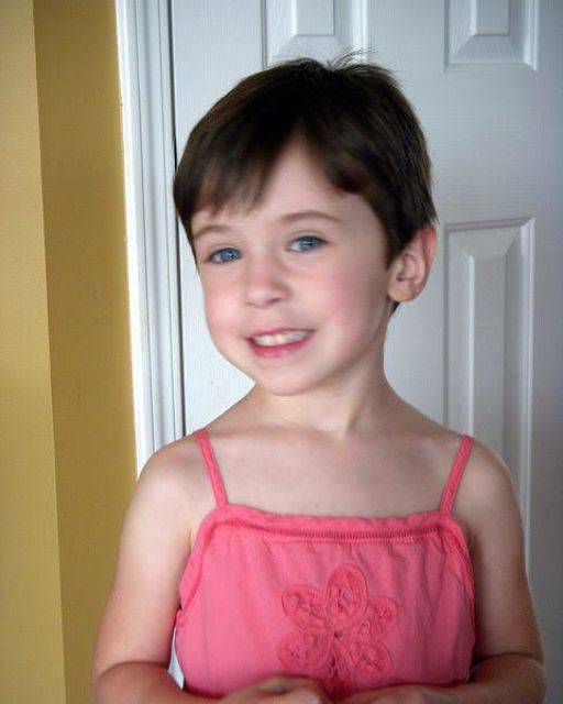 MY NIECE CAME HOME FROM PRESCHOOL IN A DRESS—BUT SHE’D LEFT IN UNIFORM SHORTS I noticed it the second she stepped out of the car. A bright coral dress, spaghetti straps slipping off her tiny shoulders, embroidered with a little flower just below the collarbone. It was not hers. We never buy clothes like that—too flimsy for play, too unfamiliar. Her cheeks were flushed, hair damp from the late-day heat, and when I asked where her uniform shorts had gone, she only shrugged. One word. “Swapped.” That was it. No fear. No shame. Just a tiny smirk playing at the edge of her lips like she was in on a secret no one else could understand. But something about it didn’t sit right. Because my niece is careful. She clings to routines like comfort blankets. Her shorts had her name stitched inside—my mother’s old trick. A single thread in her birthstone color, hidden near the waistband so nothing ever got lost at school. We even sent labeled spares in her cubby, sealed in clear ziplocks, just like the preschool handbook instructed. So how did she leave school wearing something completely foreign? And why didn’t anyone notice? I called Ms. Leena, her teacher—a woman I’d always trusted. She answered breathlessly, mid-cleanup. I asked about the clothes. Silence. Then she said, “I never saw her change. She didn’t ask for a bathroom break.” “But… we do regular checks,” she added. “I—maybe I missed it.” Maybe. I drove straight to the school. The building was nearly empty by the time I arrived—just echoes of laughter on the breeze and the distant hum of vacuums in the hallway. Her cubby was open. No shorts. No ziplock. Just a small velvet pouch shoved deep in the back corner. It was so out of place, I almost didn’t notice it. Soft. Dusty. Like it had been handled a dozen times before. I opened it slowly. Inside was— A single charm bracelet. Delicate. Too big for a child’s wrist. And one charm was missing. In its place was a tiny note. Folded four times, smudged at the edges. Written in handwriting I recognized immediately—because it matched my sister’s. The one we buried five years ago. I looked down at my niece, who was now humming quietly to herself… Wearing that coral dress like it had always belonged to her. And suddenly, I wasn’t sure what scared me more— The note… The bracelet… Or the fact that the dress she wore matched the one my sister had on the day she vanished. (Full story continues in the first 🗨️👇)